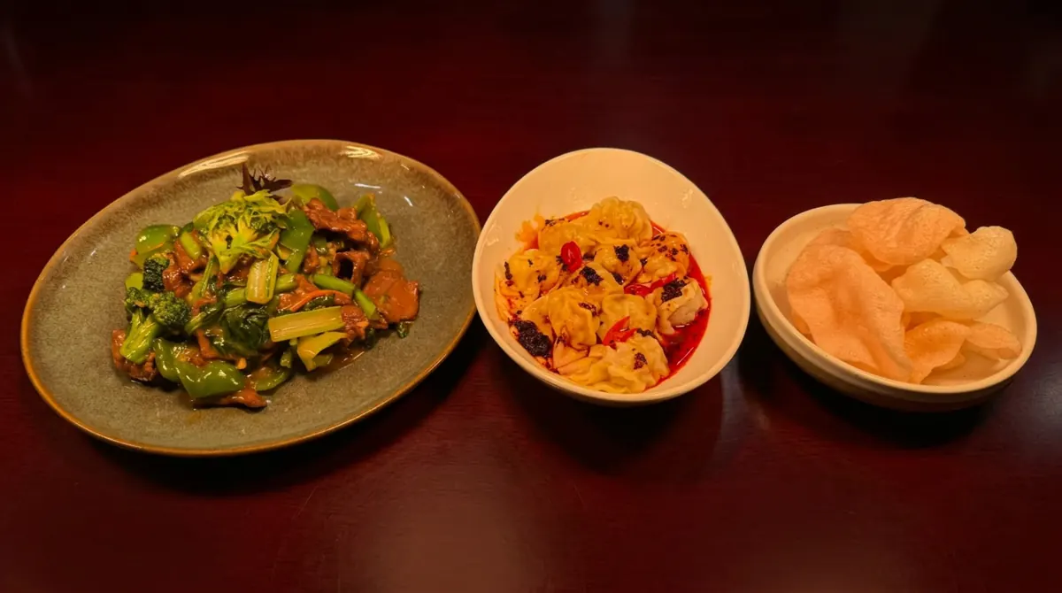 Beef with broccoli, chilli-oil wontons and prawn crackers